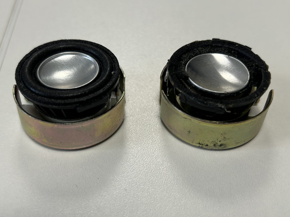 Speaker drivers at same height due to shim